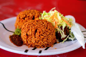 Delicious Jollof Rice with chicken and vegetables from VIVIAN TEATA'S Fingers